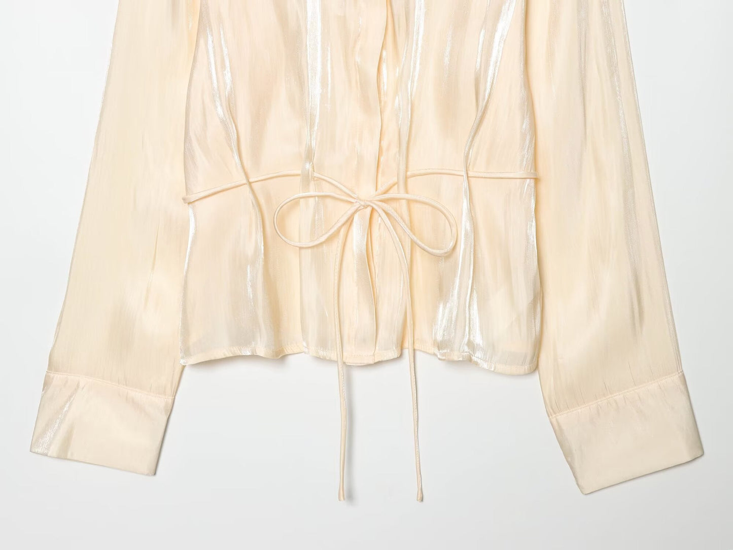 Women's metallic effect paired with belt shirt