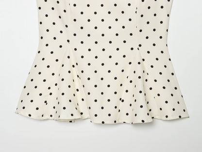 Women's ruffled hem polka dot sleeveless top