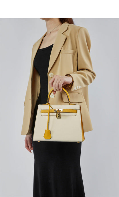 Women's New Leather Color Matching Design Palm Print Shoulder Messenger Bag Fashion Joker Handbag.