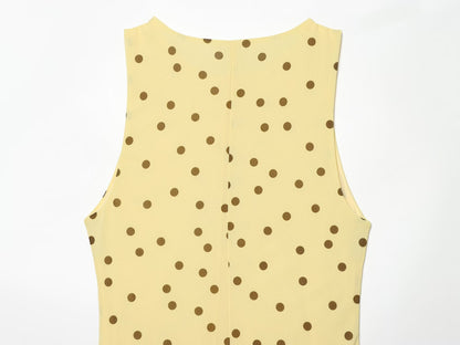 Women's sleeveless polka dot draped dress