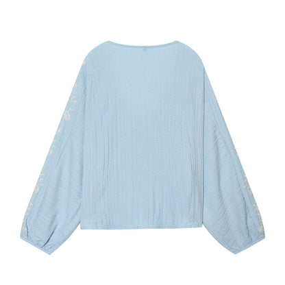 Women's contrasting embroidered V-neck shirt