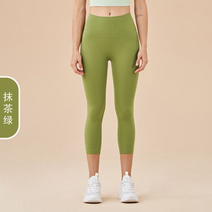 Ladies' New High-waisted Cropped Trousers Yoga Pants with No Embarrassment, Back Pocket Peach Hip-lifting Exercise Pants.