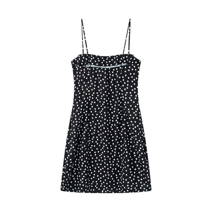 Women's sleeveless polka dot suspender dress