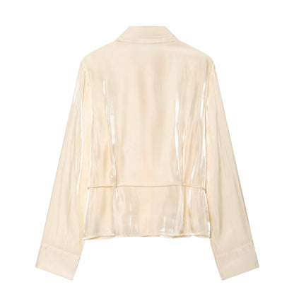 Women's metallic effect paired with belt shirt