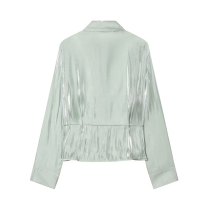 Women's metallic effect paired with belt shirt