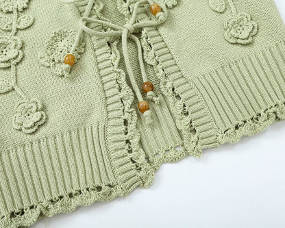 Women's flower decorated U-shaped collar tied knit cardigan