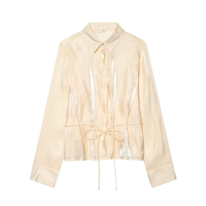 Women's metallic effect paired with belt shirt