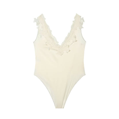 Women's lace decorated satin textured bodysuit