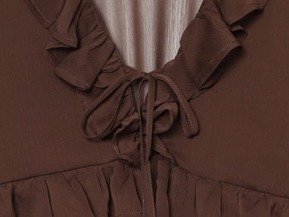 Women's slightly transparent ruffled V-neck top