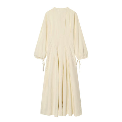 Women's long sleeved round neck pleated dress