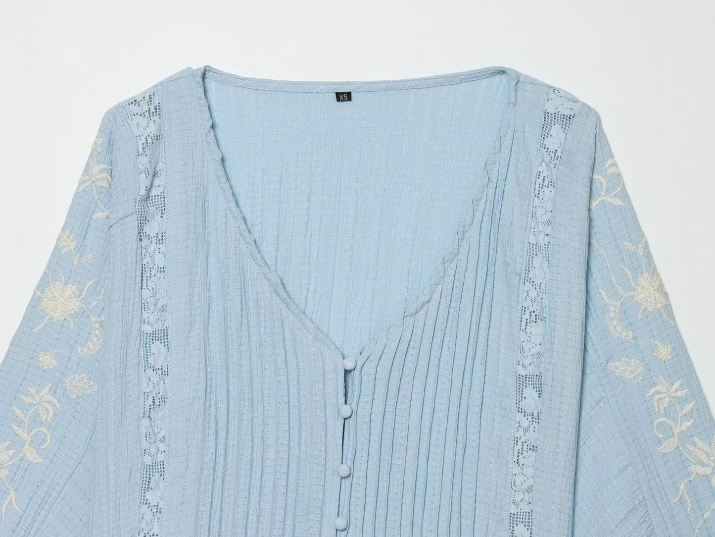 Women's contrasting embroidered V-neck shirt