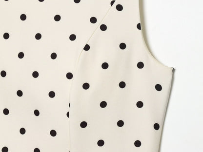 Women's ruffled hem polka dot sleeveless top